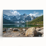 Stretched canvas wall art featuring a serene mountain landscape design, showcasing vibrant blues and greens, perfect for home decor and nature enthusiasts.