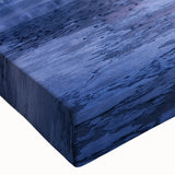 Close-up of a stretched canvas wall art piece showcasing a breathtaking mountain landscape, featuring vibrant colors and intricate details that enhance any room's aesthetic. Ideal for nature enthusiasts and home decor aficionados.