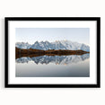 Framed wall art featuring a stunning mountain landscape design, presented in a sleek black frame with a white mat, perfect for home decor enthusiasts.
