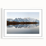 Framed wall art collection showcasing a serene mountain landscape design with a white mat and sleek frame, perfect for home decor. Ideal for nature enthusiasts.