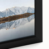 Framed canvas wall art showcasing a vibrant mountain landscape with rich colors and intricate details, perfect for enhancing home decor and creating a serene atmosphere.