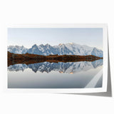Mountain landscape wall art print showcasing vibrant blue skies and rugged peaks, rolled and ready for framing. Ideal for nature-inspired decor and wall displays.