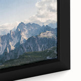 Framed canvas wall art featuring a close-up design of majestic mountains with vibrant colors, adding a serene touch to interior decor. Ideal for nature enthusiasts seeking to enhance their living space with landscape art.