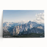 Stretched canvas wall art showcasing a serene mountain landscape design, featuring rich greens and blues, perfect for home decor and nature lovers.