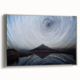Framed canvas wall art showcasing a stunning mountain landscape design, featuring vibrant colors and a silver frame, ideal for home decor and aesthetic enhancement.