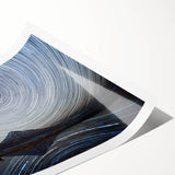 Vibrant rolled print showcasing a majestic mountain landscape with rich colors and intricate details, perfect for home decor or art collection.