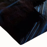 Close-up of a stretched canvas wall art featuring a vibrant mountain landscape design with rich colors and detailed textures, perfect for home decor.