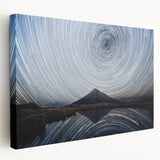 Stretched canvas wall art showcasing a vibrant mountain landscape design, featuring rich hues of blue and green, perfect for enhancing home decor and creating a serene atmosphere.