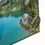 Close-up view of a vibrant acrylic wall art piece showcasing majestic mountains and landscapes, featuring rich colors and intricate details, perfect for home decor.