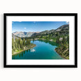 Framed black wall art featuring a stunning mountain landscape design, showcasing vibrant colors and details, perfect for enhancing home decor aesthetics.