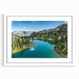 Framed wall art collection showcasing a serene mountain landscape design in soft hues, featuring a white mat and modern frame, perfect for home decor.