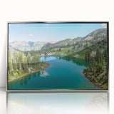 Framed acrylic wall art showcasing a serene mountain landscape with soft blue and green hues, designed for modern home decor, enhancing tranquility and nature-inspired aesthetics.