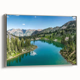 Framed canvas wall art featuring a stunning mountain landscape design, showcasing vibrant colors and intricate details, with a silver frame highlighting its elegance. Perfect for enhancing home decor in living rooms or offices.