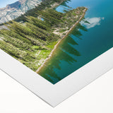 Rolled canvas art showcasing a vibrant mountain landscape design, featuring rich blues and greens, ideal for home decor. Packaged securely in a durable tube.