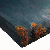 Close-up of a stretched canvas wall art piece featuring vibrant mountain landscapes, showcasing rich colors and intricate details, perfect for enhancing home decor.