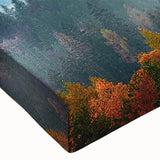 Close-up of a stretched canvas wall art piece showcasing a vibrant mountain landscape design, featuring rich colors and intricate textures, perfect for home decor.