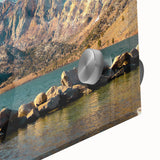 Close-up of a vibrant acrylic glass wall art piece featuring majestic mountain landscapes, showcasing intricate details and vivid colors, ideal for home decor.