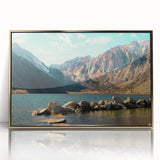 Framed acrylic wall art showcasing a stunning mountain landscape design with golden accents, perfect for home decor. This captivating piece adds elegance and warmth to any room.