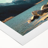 Stunning rolled canvas wall art depicting a serene mountain landscape at sunset, featuring vibrant hues of orange and purple, ideal for home decor.