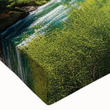 Close-up of a beautifully stretched canvas showcasing a vibrant landscape design featuring railroads and mountains, perfect for home decor enhancement.