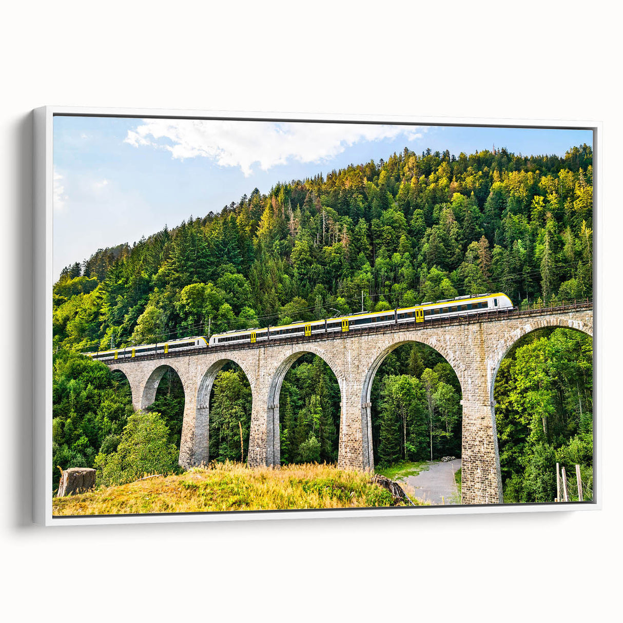 Framed canvas wall art collection showcasing a scenic railroad landscape design with vibrant colors, perfect for home decor and enhancing interior spaces.