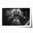 Vibrant rolled print showcasing a scenic landscape with a railroad, featuring rich colors and intricate details, perfect for home decor or art collections.