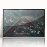Framed wall art featuring a scenic railroad landscape design in a silver-acrylic frame, showcasing vibrant colors and intricate details, perfect for home decor.