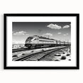Framed wall art featuring a scenic landscape with railroad tracks, set in a sleek black frame with a mat, perfect for enhancing modern home decor.