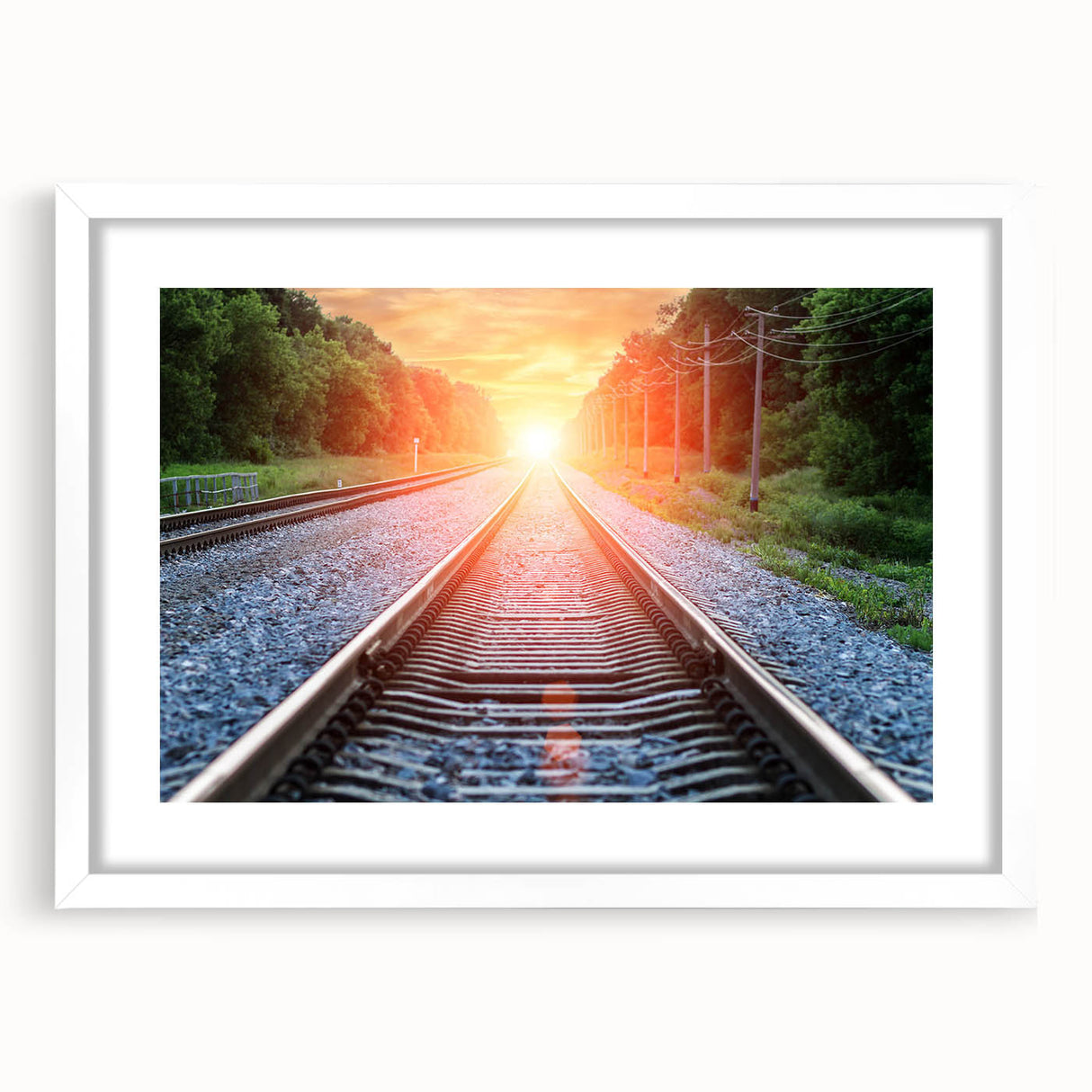 Framed wall art featuring a serene railroad landscape design with a white mat, showcasing a peaceful scene ideal for home decor, adding tranquility to any space.
