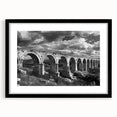 Framed black wall art featuring a scenic railroad landscape design, showcasing vibrant colors and intricate details, perfect for enhancing home decor.