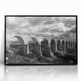 Framed acrylic wall art featuring a railroad landscape design, presented in a sleek black frame, perfect for enhancing home decor with a modern touch.