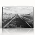Framed acrylic wall art showcasing a vibrant landscape with railroads, featuring a sleek black frame. Ideal for modern home decor, adding depth and color to any space.