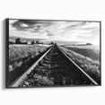 Framed canvas wall art showcasing a black and white railroad landscape design, highlighting intricate details and textures, perfect for modern home decor.