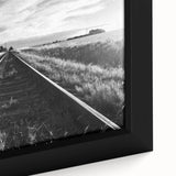 Framed wall art close-up showcasing a detailed railroad landscape design on canvas, featuring vivid colors and intricate textures, perfect for home decor.