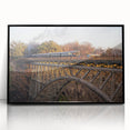 Framed acrylic wall art showcasing a vibrant landscape with a railroad theme, featuring rich colors and detailed design, ideal for modern decor.