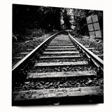 Acrylic wall art collection showcasing a vibrant landscape featuring railroad tracks, framed in sleek glass, highlighting colorful scenery and modern design.
