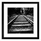 Black-framed wall art collection showcasing a serene railroad landscape design, featuring vibrant colors and intricate details, perfect for modern home decor.