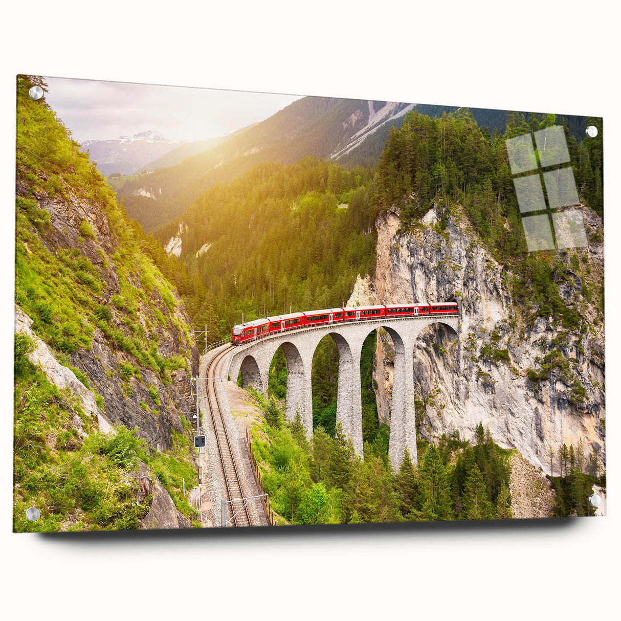 Acrylic glass wall art collection showcasing a side view of a vibrant landscape and railroad design, elegantly displayed with pins for mounting.