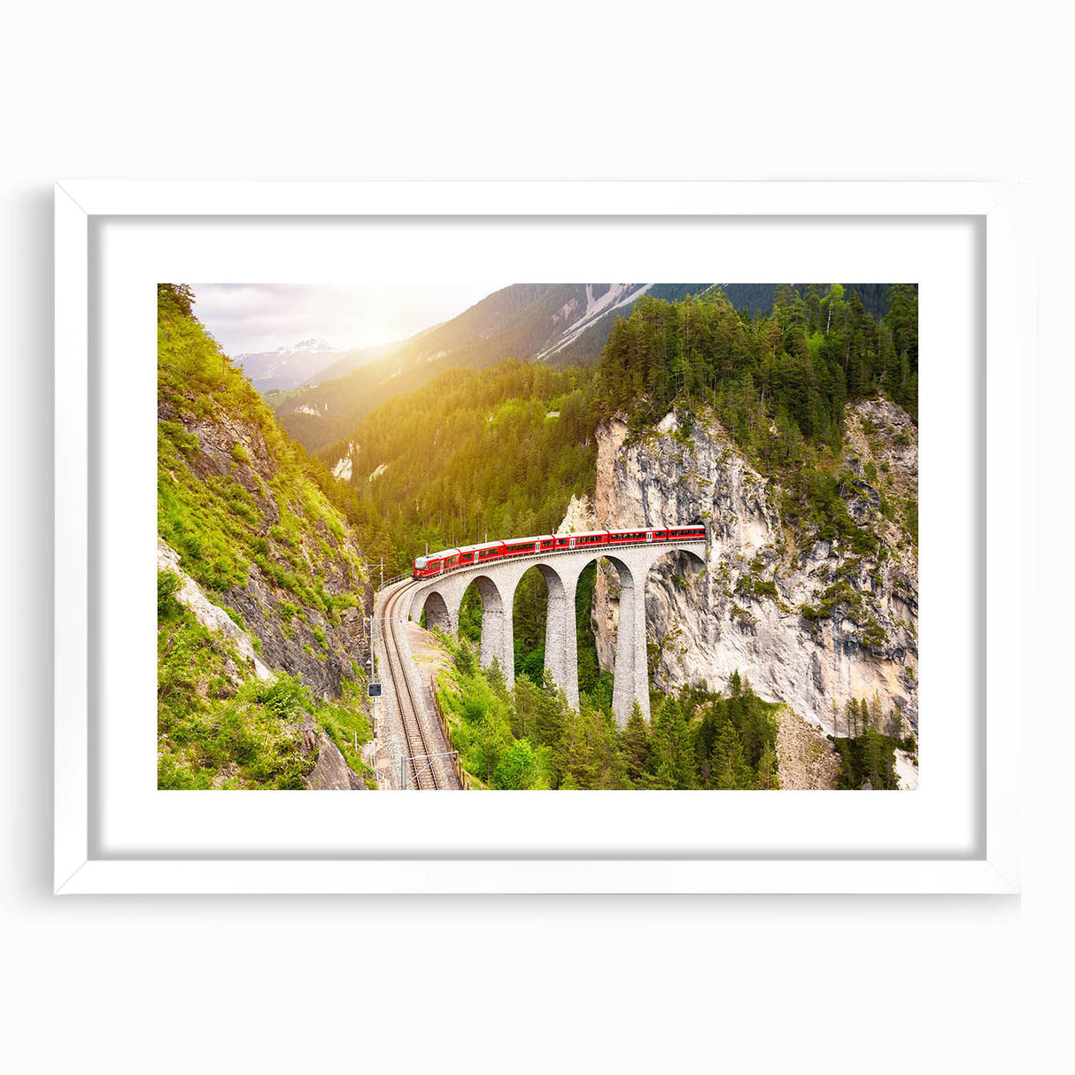 Framed wall art collection showcasing serene landscapes and railroads, featuring a sleek white mat and modern design, perfect for home decor enhancement.