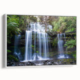Framed canvas wall art showcasing a vibrant rainforest landscape design, featuring lush greenery and vivid colors, perfect for enhancing home decor with a tropical touch.