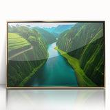 Framed acrylic wall art showcasing a vibrant rainforest landscape with lush greenery and golden accents, designed to enhance modern interiors and evoke tranquility.