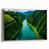 Framed canvas wall art depicting a vibrant rainforest landscape design with lush greenery and rich colors, featuring a sleek silver frame and side view angle.