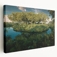 Stretched canvas wall art showcasing a vibrant rainforest landscape design with lush greenery and detailed flora, ideal for enhancing home decor or office spaces.