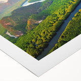 Vibrant rolled canvas showcasing a lush rainforest landscape design, perfect for home decor. The artwork features rich greens and earthy tones, encapsulating nature's beauty. Ideal for adding a serene touch to any space.