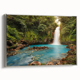Framed canvas wall art showcasing a vibrant rainforest landscape design, featuring lush greenery and intricate details, with a sleek silver frame enhancing its elegance. Perfect for adding a touch of nature to home decor.