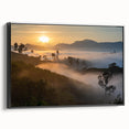 Framed canvas wall art showcasing a vibrant rainforest landscape design, featuring rich green foliage and intricate details, presented in a sleek black frame.