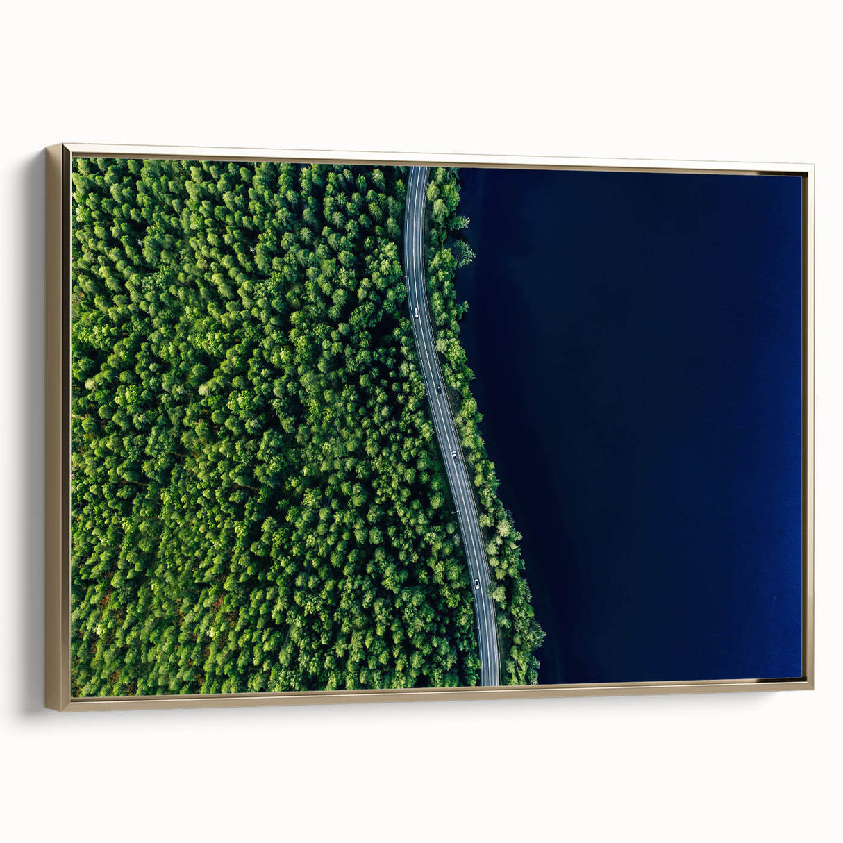 Framed canvas wall art showcasing a stunning landscape with winding roads, highlighted by gold accents, perfect for enhancing modern home decor.