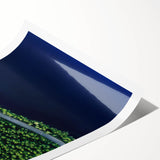 Rolled print showcasing a vibrant landscape road design with rich colors and intricate details, ideal for home decor or art collection display.