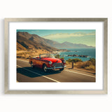 Framed silver wall art featuring a scenic landscape design, including winding roads and vibrant colors, set within a mat for an elegant presentation.