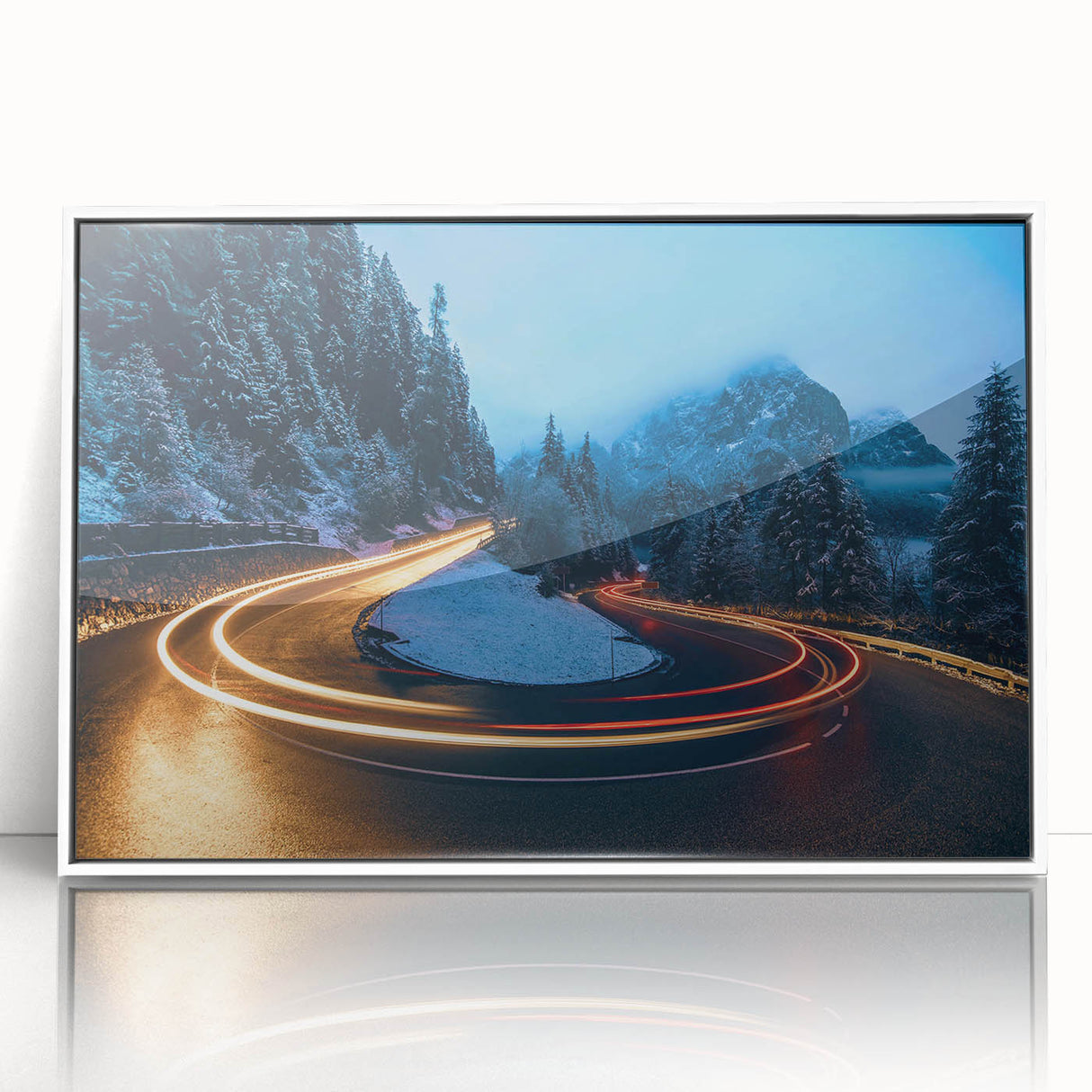 Framed acrylic wall art showcasing a serene landscape with winding roads, designed for modern decor. The piece has a sleek white frame and enhances any room with its tranquil aesthetic. Perfect for nature lovers and home decorators seeking stylish art.
